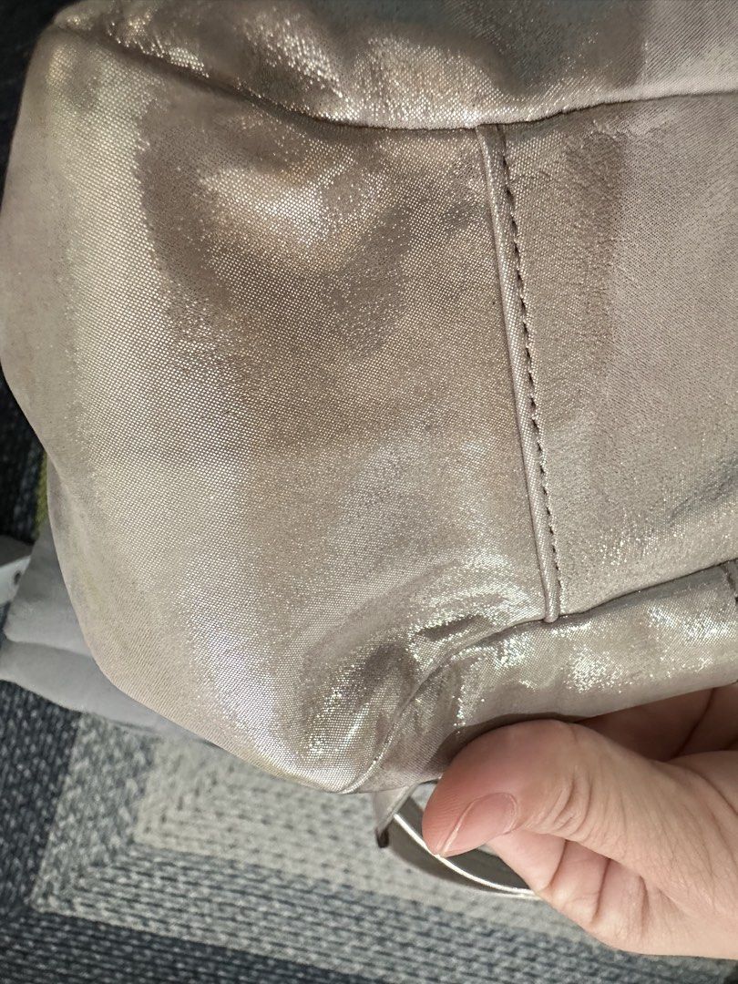 ⁠Authentic Coach Metallic Fabric / Canvas Tote Bag⁠ (Category: Shoulder Bags) located in Manila. Submitted by emily.santiago (Listing ID 1469974729, Image 3). Description: AUTHENTIC COACH METALLIC LEATHER TOTE BAG Classy and spacious Coach tote in a chic metallic finish with signature gold-tone “COACH EST. 1941” hardware plaque! Perfect for daily use, work, or casual outings. Product Details: Brand: Coach Material: Metallic Woven Fabric / Coated 