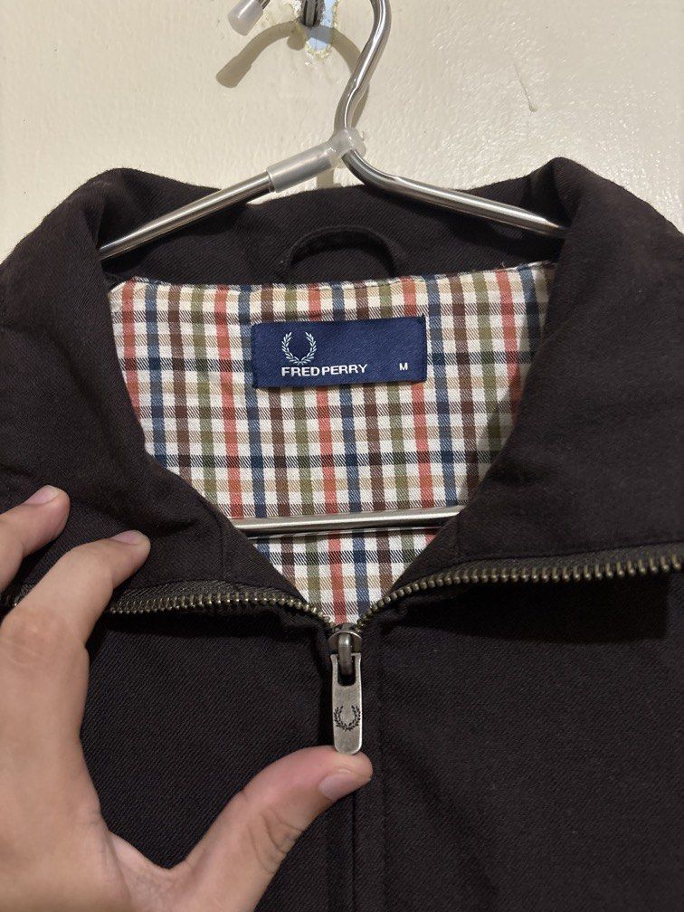 Authentic Fred Perry Harrington Jacket (Category: Coats, Jackets and Outerwear) located in Muntinlupa City. Submitted by owrayttttt (Listing ID 1470116697, Image 2). Description: - Authentic Fred Perry Harrington Jacket - Complete tags - Dimes is 23x27 - Minor flaw, scratch on the back part of the collar, not noticeable when folded - free shipping via j&t.