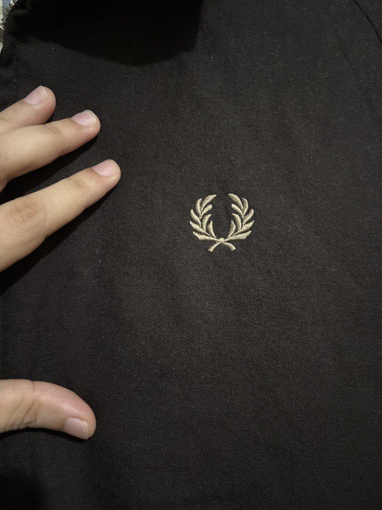 Authentic Fred Perry Harrington Jacket (Category: Coats, Jackets and Outerwear) located in Muntinlupa City. Submitted by owrayttttt (Listing ID 1470116697, Image 3). Description: - Authentic Fred Perry Harrington Jacket - Complete tags - Dimes is 23x27 - Minor flaw, scratch on the back part of the collar, not noticeable when folded - free shipping via j&t.