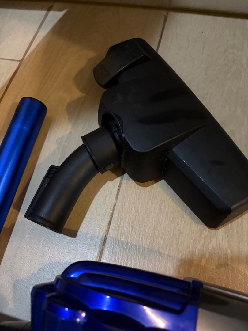 AUTHENTIC HANABISHI Vacuum Cleaner Dry Use High Suction Power (Category: Vacuum Cleaner & Housekeeping) located in Antipolo. Submitted by renz_1 (Listing ID 1470050009, Image 3). Description: - Brand/Model: Hanabishi Vacuum Cleaner - Type: Dry use only handheld vacuum - Suction: High suction power for efficient cleaning - Design: Dark grey and blue body with transparent dust cup, blue extension wand, and black floor head - Usage: Cleans floors an