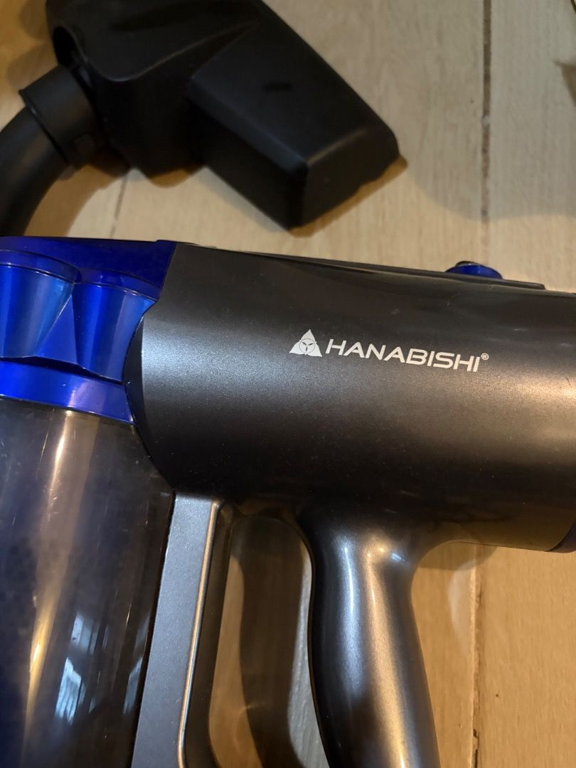 AUTHENTIC HANABISHI Vacuum Cleaner Dry Use High Suction Power (Category: Vacuum Cleaner & Housekeeping) located in Antipolo. Submitted by renz_1 (Listing ID 1470050009, Image 2). Description: - Brand/Model: Hanabishi Vacuum Cleaner - Type: Dry use only handheld vacuum - Suction: High suction power for efficient cleaning - Design: Dark grey and blue body with transparent dust cup, blue extension wand, and black floor head - Usage: Cleans floors an