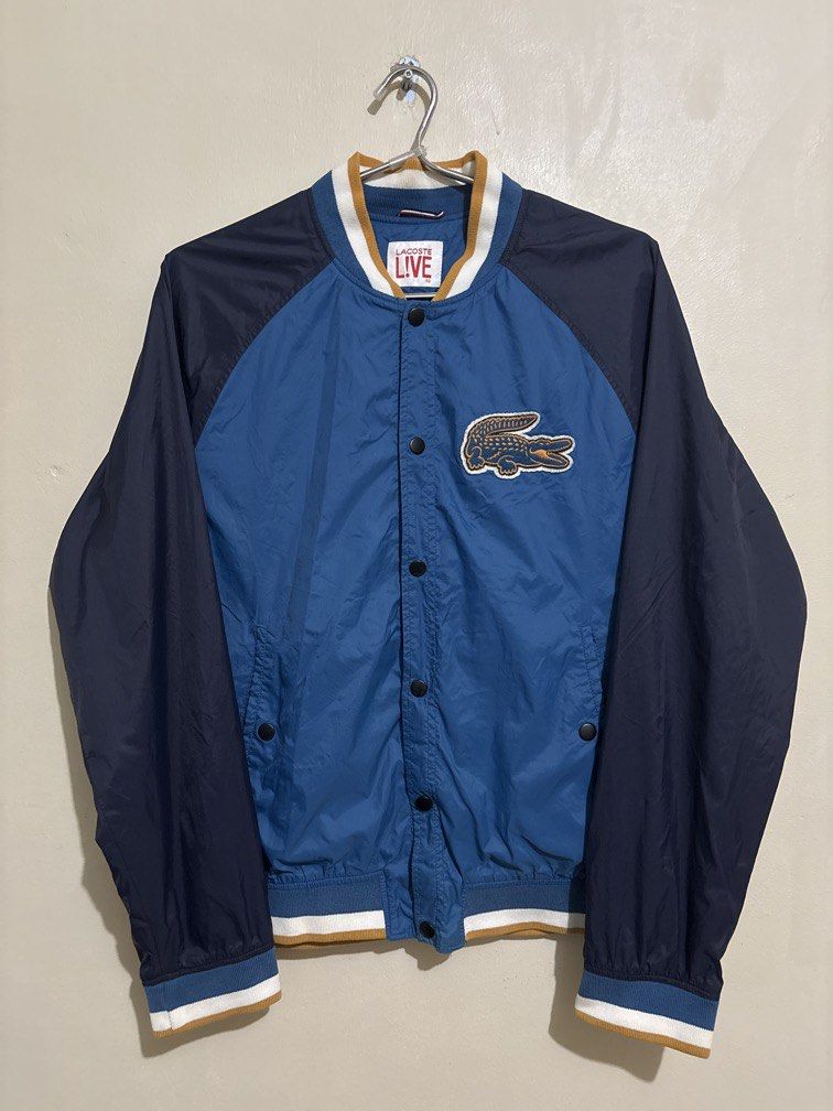 Authentic Lacoste Live Varsity Jacket (Category: Coats, Jackets and Outerwear) located in Muntinlupa City. Submitted by owrayttttt (Listing ID 1470114886, Image 1). Description: - Authentic Lacoste Live Varsity Jacket - Dimes is 23x26 - Complete tags - No issue - Free shipping via j&t.
