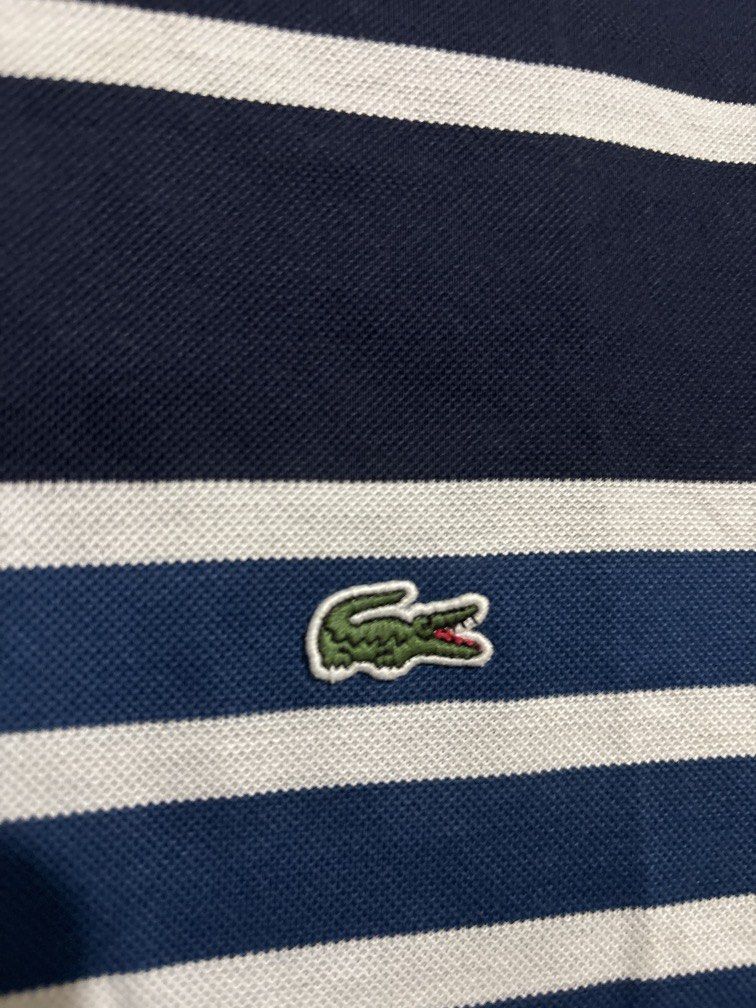 Authentic Lacoste Polo (Category: Tshirts & Polo Shirts ) located in Muntinlupa City. Submitted by owrayttttt (Listing ID 1470131102, Image 3). Description: - Authentic Lacoste - Size 5 on tag - Dimes is 21x28 - complete tags - No issue - Free shipping via j&t.