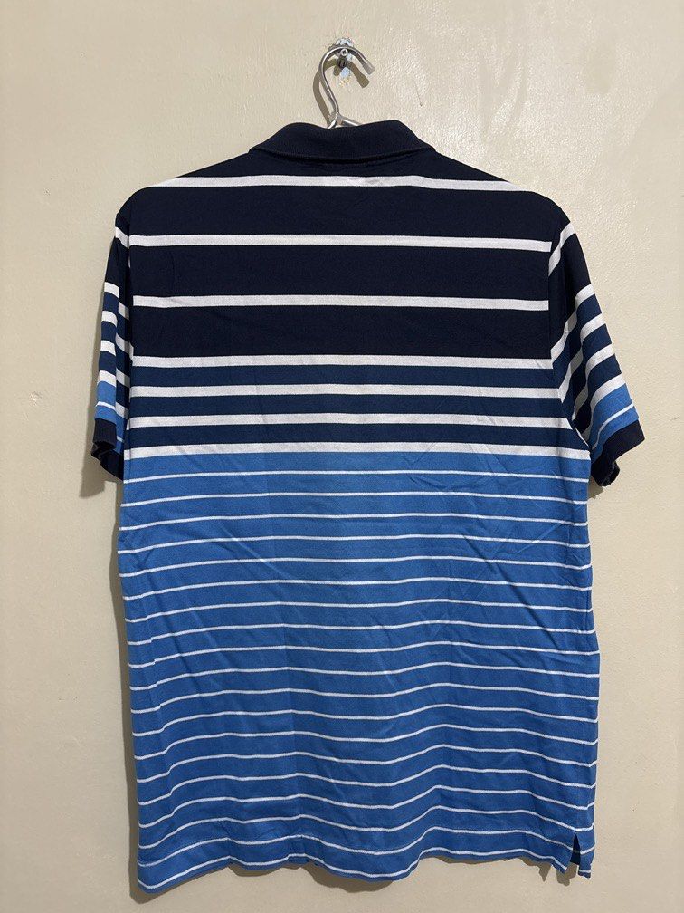 Authentic Lacoste Polo (Category: Tshirts & Polo Shirts ) located in Muntinlupa City. Submitted by owrayttttt (Listing ID 1470131102, Image 2). Description: - Authentic Lacoste - Size 5 on tag - Dimes is 21x28 - complete tags - No issue - Free shipping via j&t.
