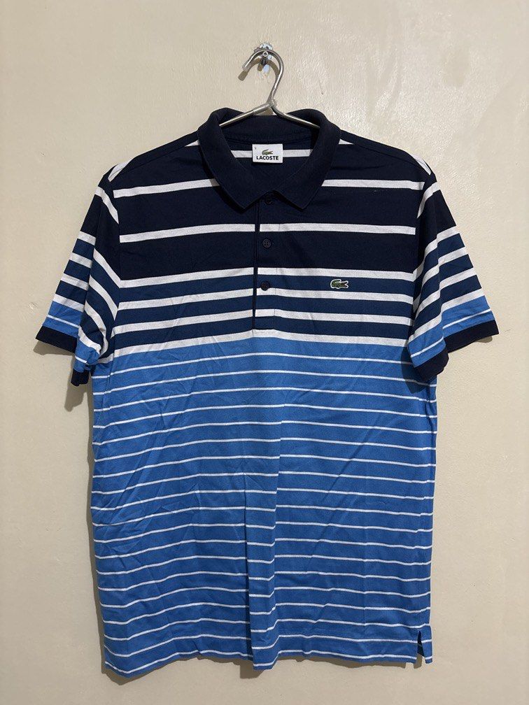 Authentic Lacoste Polo (Category: Tshirts & Polo Shirts ) located in Muntinlupa City. Submitted by owrayttttt (Listing ID 1470131102, Image 1). Description: - Authentic Lacoste - Size 5 on tag - Dimes is 21x28 - complete tags - No issue - Free shipping via j&t.