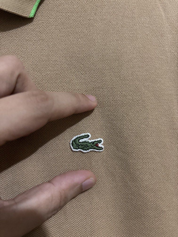 Authentic Lacoste Polo shirt (Category: Tshirts & Polo Shirts ) located in Muntinlupa City. Submitted by owrayttttt (Listing ID 1470129565, Image 3). Description: - Authentic Lacoste Polo shirt - Size 4 on tag - Dimes is 21x26 (perfec for medium) - Complete tags - No issue - Free shipping via j&t.