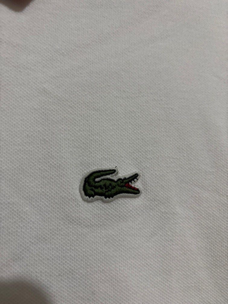 Authentic Lacoste Sport Polo (Category: Tshirts & Polo Shirts ) located in Muntinlupa City. Submitted by owrayttttt (Listing ID 1470131335, Image 3). Description: - Authentic Lacoste Sport Polo - Size 5 on tag - Dimes is 21x28 - Complete tags - Needs to be washed, pin hole (please check last photo) - Free shipping via j&t.