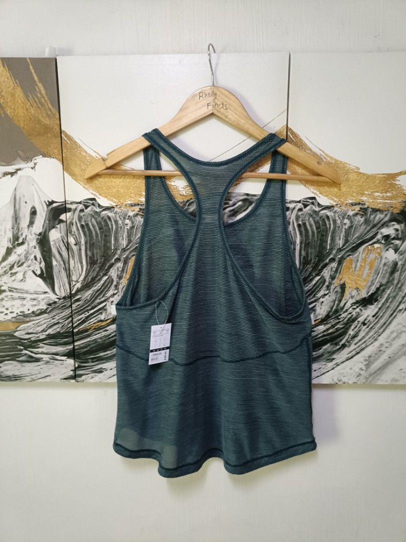 AUTHENTIC Lululemon Essential Tank - Heathered Dark Forest (Category: Activewear) located in Manila. Submitted by bvnnie (Listing ID 1470010333, Image 3). Description: AUTHENTIC Lululemon Essential Tank Heathered Dark Forest inches Armpit to Armpit/Widht 19 Lenght/ 26 fittings is Large Excellent Condition, Issue: Message if you have any other question about sizing. We do shipping nation wide I'm also A A open for video call so that you can see th