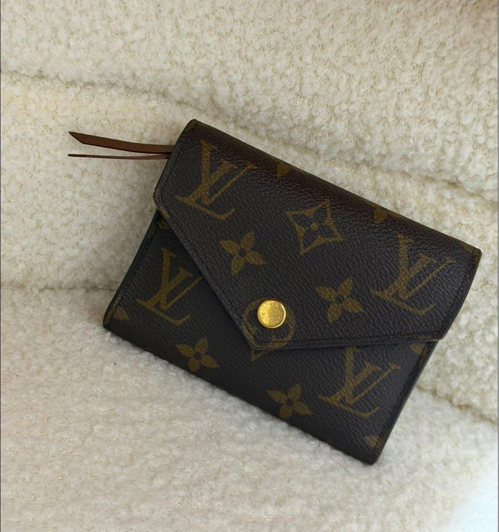 Authentic LV Victorine Monogram Microchipped (Category: Luxury Bags & Wallets) located in Pasig City. Submitted by sheyfabph (Listing ID 1469983170, Image 2). Description: Authentic Louis Vuitton Victorine wallet in classic Monogram canvas Minimal signs of use P16,500 .