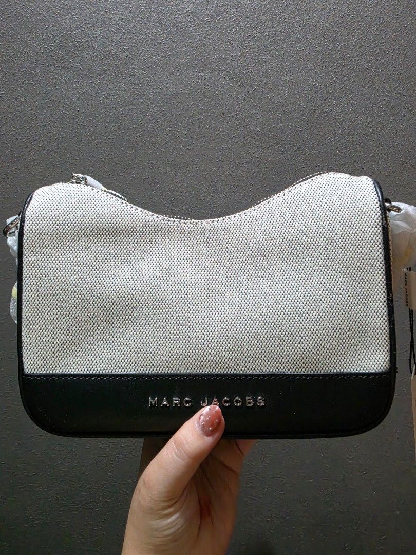 Authentic MJ Small Drifter (Category: Cross-body Bags) located in Manila. Submitted by chengcruz17 (Listing ID 1470091443, Image 1). Description: 100% Authentic Padala from US w/ paper bag Negotiable for sure buyer With minor flaws (see last pictures) not really visible Natago lang, never nagamit rfs: decluttering.