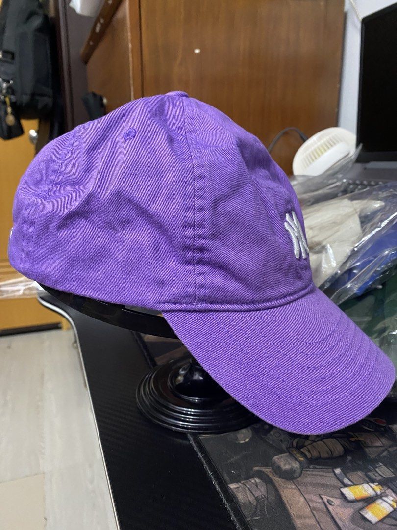 Authentic MLB New York Yankees Purple Baseball Cap (Category: Caps & Hats) located in Quezon City. Submitted by freshfitsbyja (Listing ID 1470105761, Image 2). Description: MLB New York Yankees Purple Baseball Cap Color Rate; 8/10 Condition: Fair - Good Bleach Stain on the Left Side.