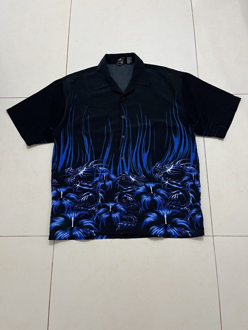 Authentic Shaolin Blue Dragon Print Short Sleeve Shirt (Category: Tshirts & Polo Shirts ) located in Pasig City. Submitted by thousandthrift69 (Listing ID 1470070669, Image 1). Description: - Brand: Authentic Shaolin - Color: Black with striking blue dragon and flame graphics - Size: Large (Relaxed fit) - Material: 100% Polyester, Made in Korea - Style: Short sleeves, camp collar, bold graphic design - Condition: Excellent / Ready to wear.