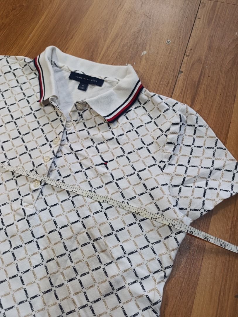 Authentic Tommy Hilfiger AOP Polo Shirt (Category: Others Tops) located in Bulacan. Submitted by koritoo (Listing ID 1470006103, Image 3). Description: Authentic Tommy Hilfiger AOP Polo Shirt Good as new no issue Size M Dimensions: 19 Width 18.5 Waist 22 Length Color rate: 10/10.
