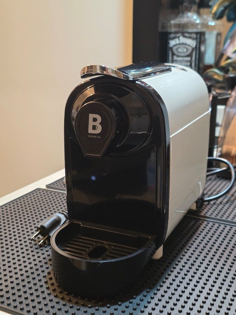 B Coffee Co. Capsule Coffee Machine (Category: Coffee Machines & Makers) located in Quezon City. Submitted by johnjaynardyap (Listing ID 1469960670, Image 1). Description: B Coffee Co. Freshman Capsule Coffee Machine (Nespresso Compatible) ​ Selling a very lightly used B Coffee Co. Freshman coffee pod machine. -Excellent working condition. ​-Compatible with standard Nespresso Original capsules and third-party pods (Starbucks, UCC, L'Or) ​Specs: 1