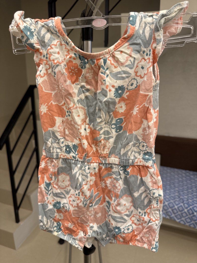 Baby floral romper 18M (Category: Babies & Kids Fashion) located in Manila. Submitted by __nix (Listing ID 1470005981, Image 1). Description: - Adorable peach and grey floral print - Size: 18 months - Material: 100% soft and breathable cotton - Features cute flutter sleeves and an elastic waistband - Convenient bottom snap buttons for quick and easy diaper changes.