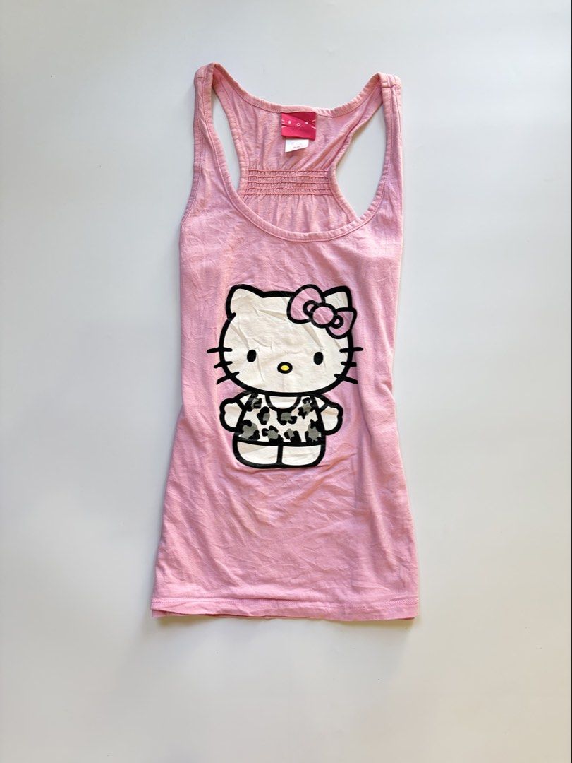 baby pink hello kitty tank top (Category: Sleeveless) located in Tarlac. Submitted by pearl_xoxo (Listing ID 1470108246, Image 1). Description: - baby pink hello kitty tank top bust: 15” waist: 14 1/2” length: 23” size: m-l issue: needwash brand: hello kitty .