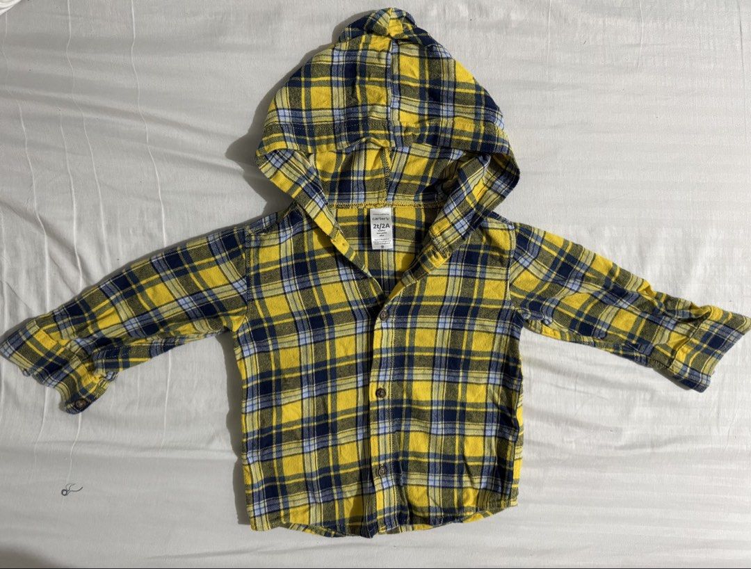 Baby top (Category: Babies & Kids Fashion) located in Paranaque City. Submitted by april_anythingpreloved (Listing ID 1470096775, Image 1). Description: - Brand: Carter's - Size: 2T - Color/Pattern: Yellow and blue plaid - Material: Comfortable cotton - Features: Attached hood, button-down front, long sleeves - Bought in the US - RFS: Decluttering - Location: Paranaque.