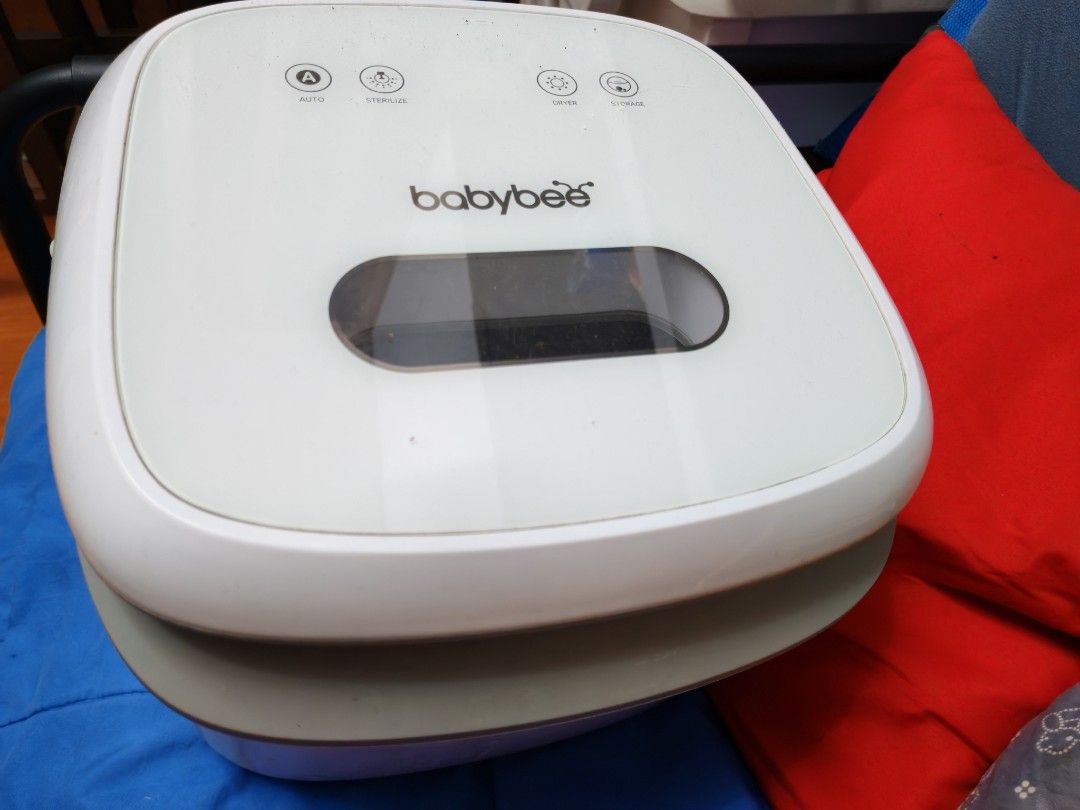 Babybee BUV6902 UV Sterilizer White (Category: Breastfeeding & Bottle Feeding) located in Malabon City. Submitted by decluttering97 (Listing ID 1470049735, Image 2). Description: Good working condition - Babybee UV Sterilizer in clean white finish - Touch controls on lid with auto, sterilize, dryer, and storage modes - Stainless steel interior with removable wire rack - Includes power cord - Clean inside and out, works great for daily baby care R