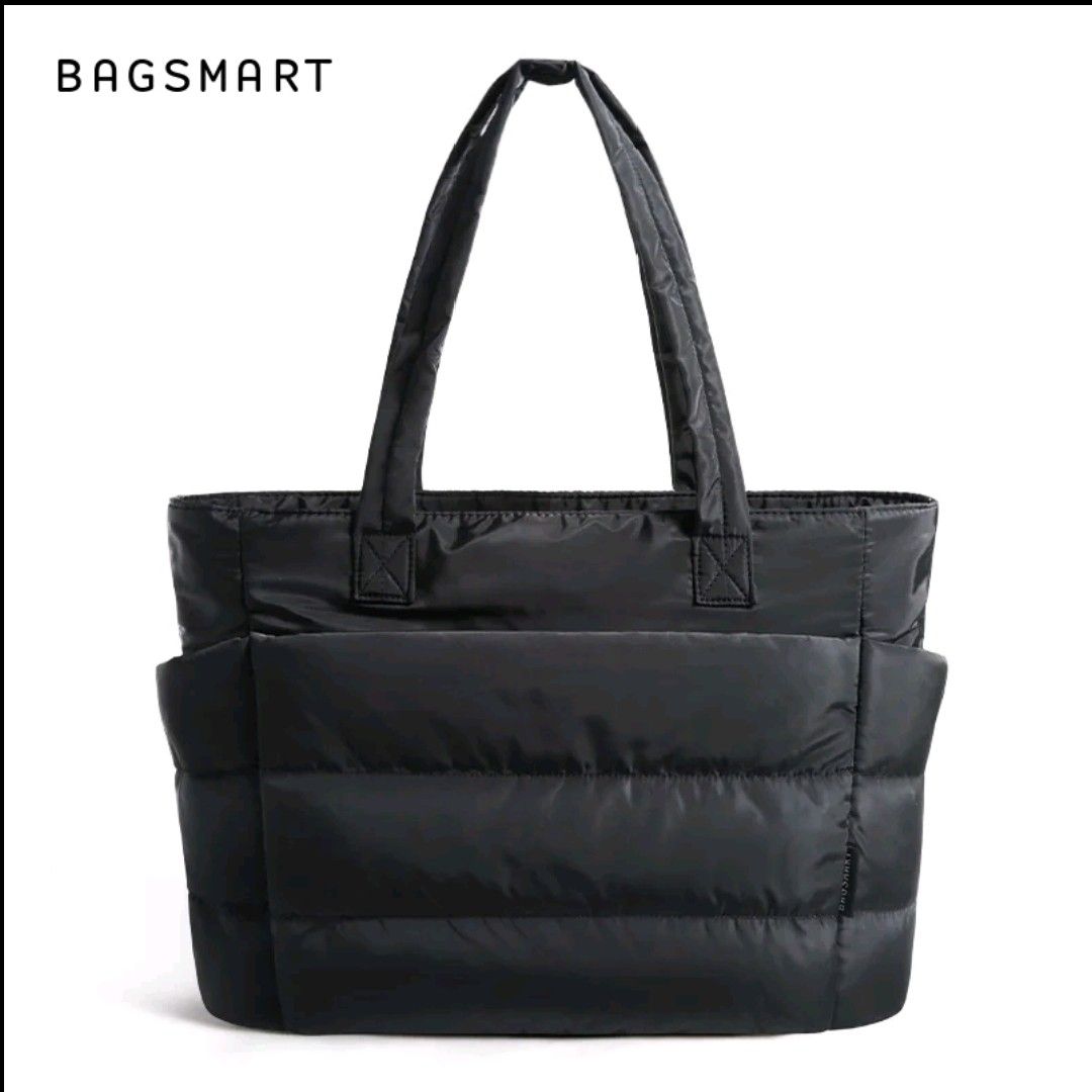 BAGSMART Puffer Tote Bag MEDIUM (Category: Tote Bags) located in Taguig. Submitted by rrdurant (Listing ID 1470021729, Image 1). Description: - Brand: BAGSMART - Color: Classic Black - Dimensions: 13.8" x 6.3" x 19.3" - Laptop Capacity: Fits up to a 15.6-inch laptop securely with a Velcro strap - Exterior: Soft quilted nylon with convenient side pockets and sturdy dual shoulder straps - Interior: Chic beige lining equipped with multiple organizat