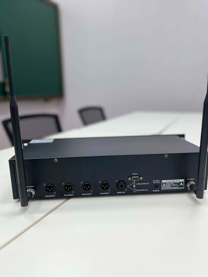 Baiervires BS-7400S Wireless Microphone Receiver (Category: Soundbars, Speakers & Amplifiers) located in Paranaque City. Submitted by digitalconcept.corp (Listing ID 1469969137, Image 2). Description: - Model: Baiervires BS-7400S wireless receiver unit in a sleek black rackmount chassis - Display & Controls: Front display panel equipped with intuitive rotary control knobs and power switch - Antennas: Includes dual antennas securely mounted on the