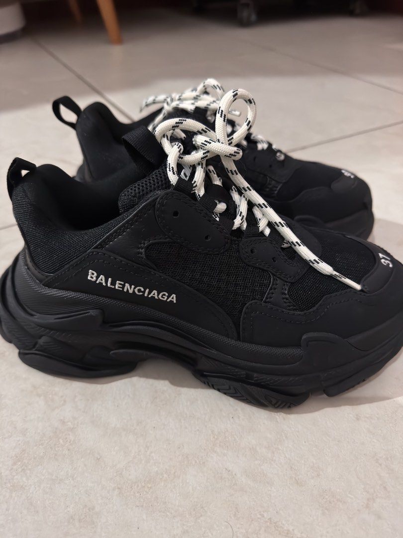 Balenciaga Triple S Black White Size 37 (Category: Sneakers) located in Quezon City. Submitted by awsalvador (Listing ID 1470040249, Image 3). Description: - Brand: Balenciaga - Model: Triple S Chunky Sneakers - Colorway: Triple Black with white details - Size: 37 (embroidered on the toe) - Laces: Contrast black and white rope laces - Design: Bold layered sole with signature side branding and Triple S tongue text - Condition: Great statement shoe