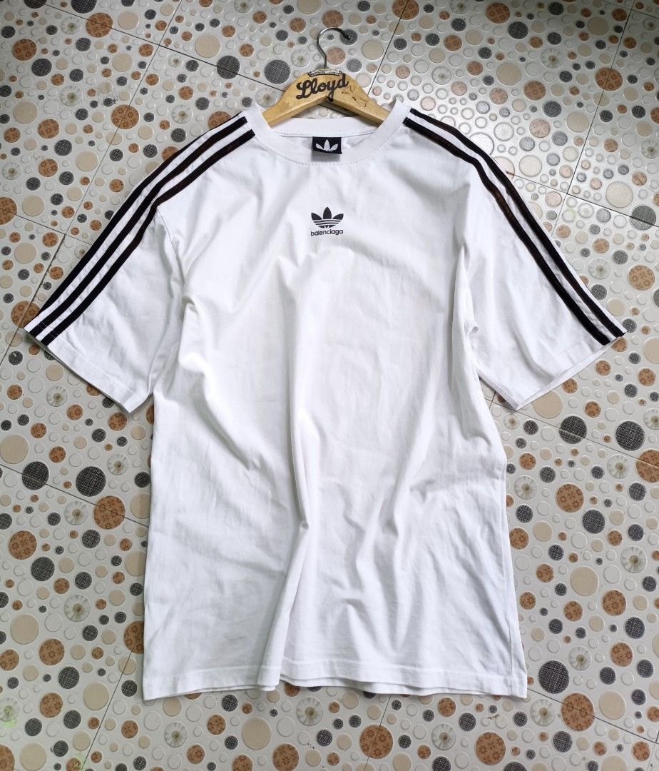 Balenciaga x adidas (Category: Tshirts & Polo Shirts ) located in Manila. Submitted by chavez_lloyd (Listing ID 1470112971, Image 1). Description: Balenciaga x adidas oversized size: small dim's: W'21 × L'29 VGOOD condition issue see last pic LOC negross occidental.