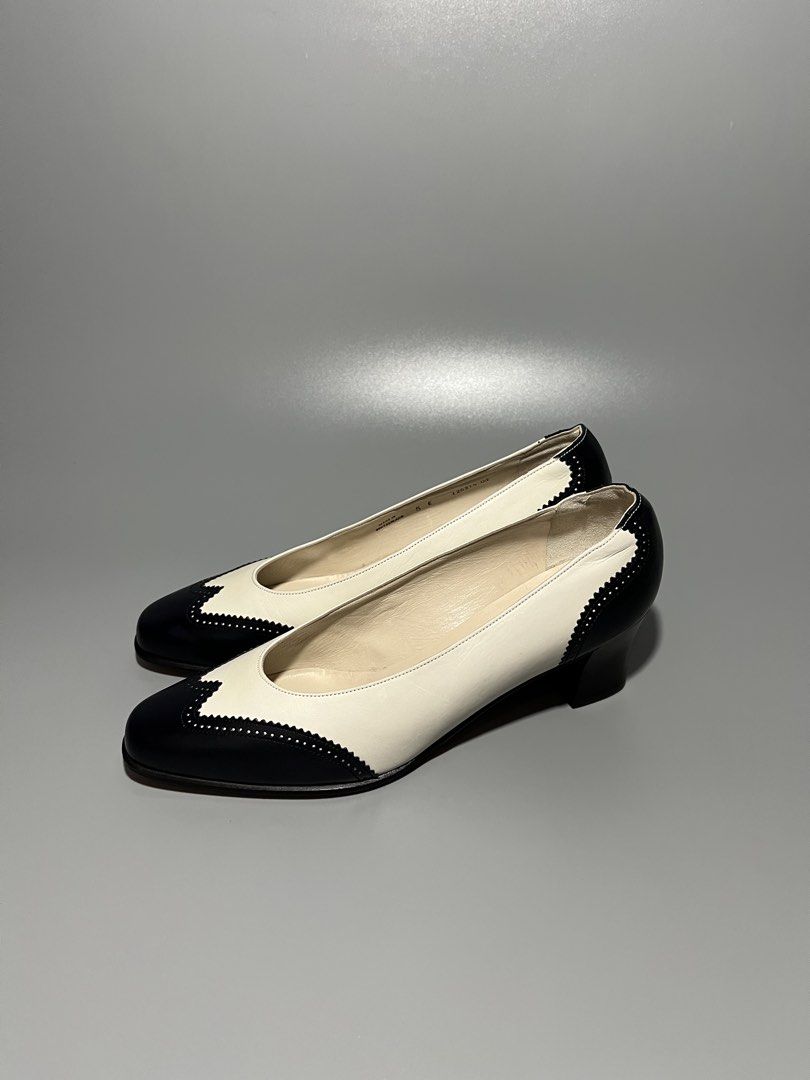 Bally "Vasano" Spectator Pumps (Category: Heels) located in Caloocan City. Submitted by jvn_23 (Listing ID 1470063216, Image 3). Description: Bally “Vasano” Spectator Pumps Authentic/Legit💯 Excellent Condition 📍 No issue❗️ Color rate: 10/10📍 Size: US 7 / EU 38 These vintage Bally “Vasano” spectator pumps feature an elegant cream leather silhouette contrasted by a scalloped, micro-perforated black wingtip toe cap and traditional Swiss-made bran