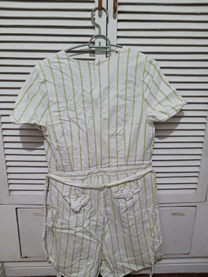 Banana Republic Striped Romper Size 16 Long (Category: Rompers) located in Quezon City. Submitted by rdonelle (Listing ID 1470083361, Image 3). Description: - Brand: Banana Republic - Style: White romper with yellow vertical stripes - Features: V-neck wrap front, short sleeves, built-in waist tie, back zipper closure - Size: 16 Long - Condition: Clean fabric, no flaws spotted, great for warm days.