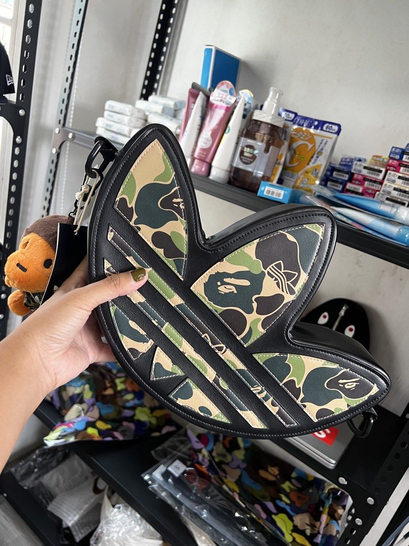Bape adidas trefoil bag (Category: Sling Bags) located in Cavite. Submitted by ziicollections (Listing ID 1469982855, Image 1). Description: Onhand available Bape x adidas trefoil bag Brand new Japan release This is a rare item .