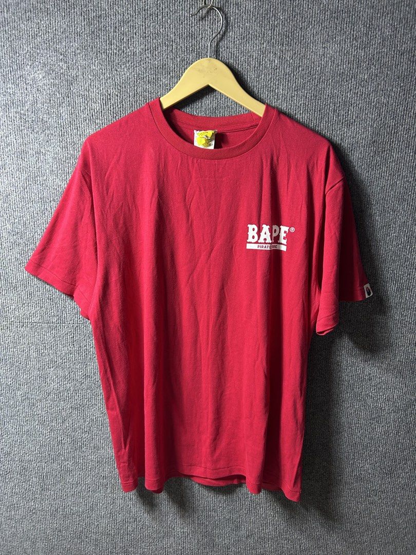 BAPE PIRATES TEE (Category: Activewear) located in Manila. Submitted by cy_bakz (Listing ID 1470101877, Image 2). Description: GUARANTEED AUTHENTIC MENS / -BAPE PIRATES TEE- (RED) SIZE :LARGE ON TAG (Mens) LENGTH : 28 WIDTH : 22 (MEASURED IT BY INCHES) COLOR RATE - 9.8/ 10 OVER ALL CONDITION - 9.8/ 10 IN EXCELLENT CONDITION NO FLAWS / ISSUES (NEED WASH ONLY) ₱ 📩📥 PRICE • Slightly Negotiable • Bacolod City meet up for checking • Open for COD aro