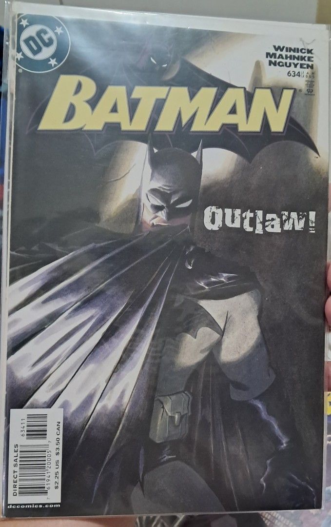 Batman 634 DC Comic Book Outlaw Jan 2005 (Category: Comics & Manga) located in Quezon City. Submitted by ernestamaru2 (Listing ID 1470030552, Image 1). Description: - Title: DC Batman #634 (Outlaw) - Publication Date: January 2005 - Creators: Written by Winick, art by Mahnke and Nguyen - Edition: Direct sales edition ($2.25 US / $3.50 CAN) - Condition: Bagged and boarded for maximum protection - Perfect addition to any Batman or DC comics collect