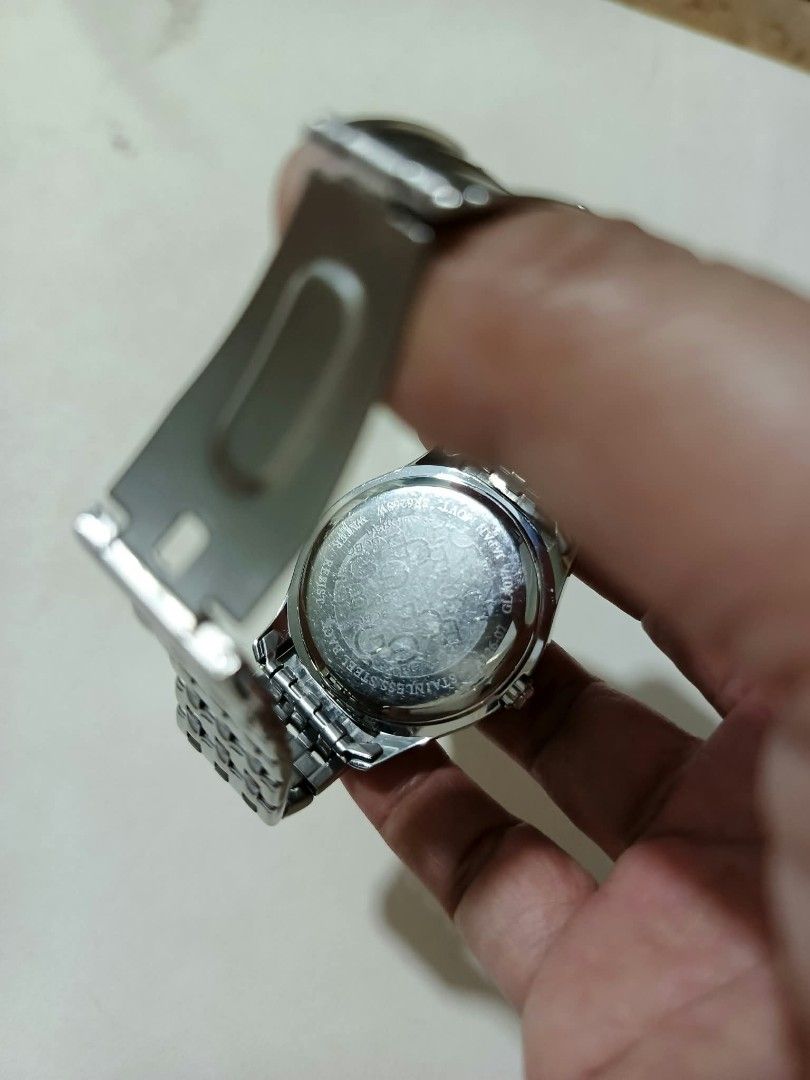 BCBGGirls Silver Tone Rhinestone Watch (Category: Women's Watches) located in Abucay. Submitted by thrifty.picked (Listing ID 1470123624, Image 3). Description: - Brand: BCBGGirls - Color: Silver tone - Dial: Mother of pearl covered in rhinestone details with a sparkling crystal bezel - Closure: Link bracelet with fold-over clasp - Features: Stainless steel back, water resistant, Japan movement - Condition: Minor wear on the metal surface.