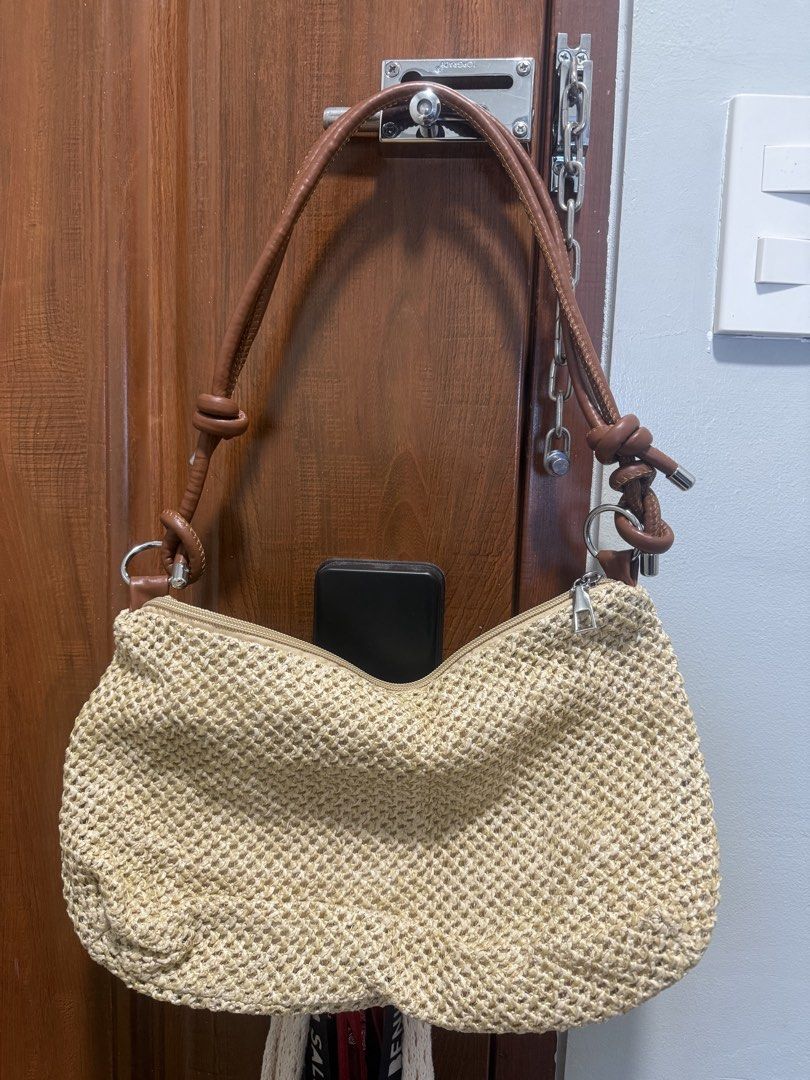 Beach bag bundle (Category: Shoulder Bags) located in Manila. Submitted by iya.prlta (Listing ID 1469999946, Image 1). Description: - Cream woven shoulder bag with stylish brown faux leather straps - Features knotted accents for a chic touch - Secure top zipper closure to keep your belongings safe - Roomy interior with plenty of space for daily essentials - Versatile neutral color that matches any casual outfit - Pristine condition, stored proper