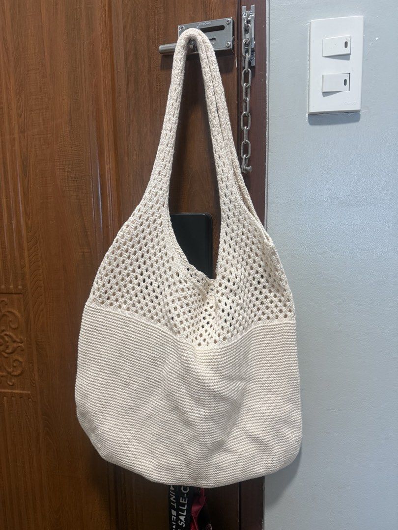Beach bag bundle (Category: Shoulder Bags) located in Manila. Submitted by iya.prlta (Listing ID 1469999946, Image 2). Description: - Cream woven shoulder bag with stylish brown faux leather straps - Features knotted accents for a chic touch - Secure top zipper closure to keep your belongings safe - Roomy interior with plenty of space for daily essentials - Versatile neutral color that matches any casual outfit - Pristine condition, stored proper
