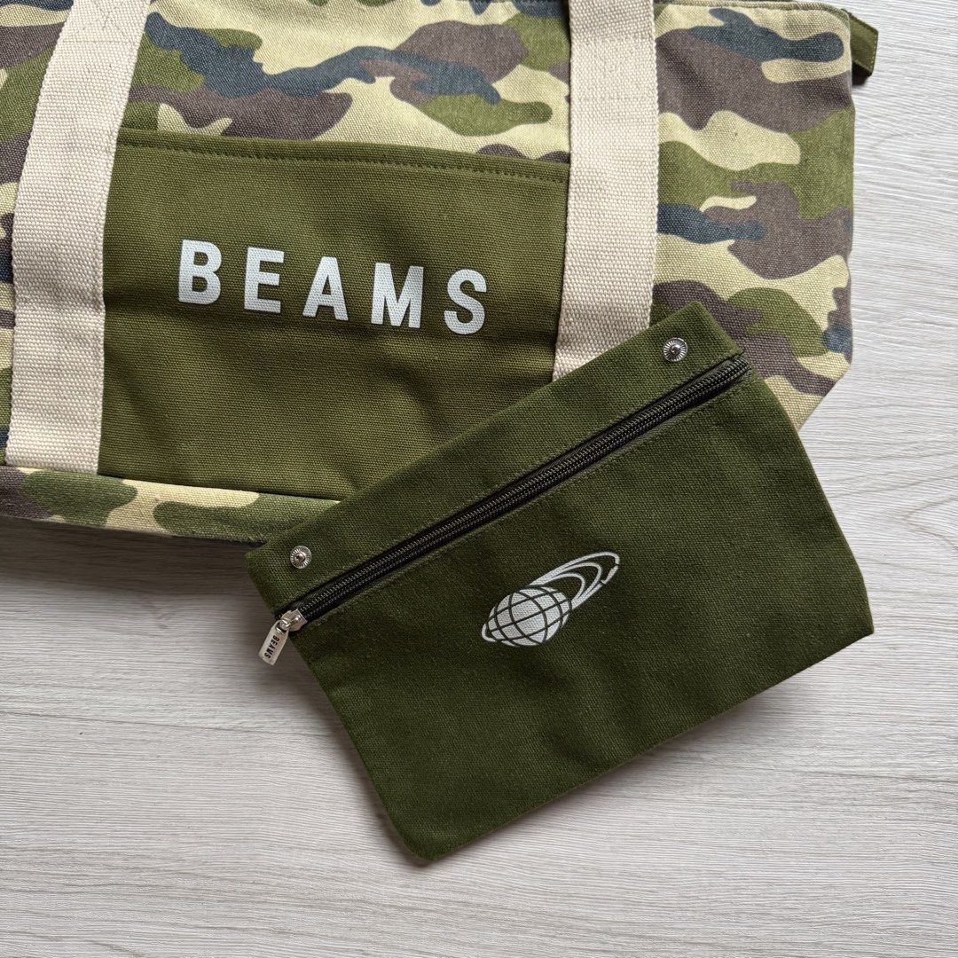 BEAMS Limited Edition Camo Double-Layer Travel Bag (Category: Sling Bags) located in Zamboanga. Submitted by rustic.rev (Listing ID 1470073204, Image 2). Description: BEAMS Limited Edition Camo Double-Layer Travel Bag In excellent condition, minimal ink stain see last photo Actual Measurements: Width: 18” Length: 13” Depth: 6.5”.