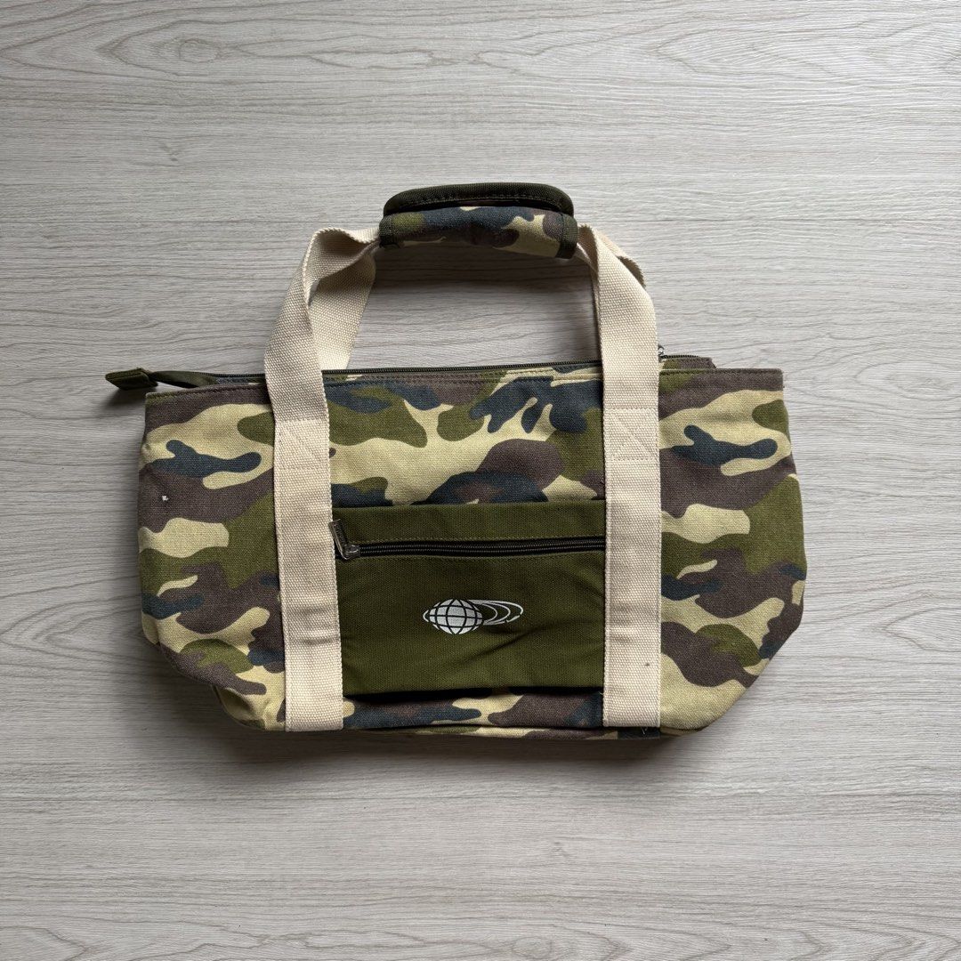 BEAMS Limited Edition Camo Double-Layer Travel Bag (Category: Sling Bags) located in Zamboanga. Submitted by rustic.rev (Listing ID 1470073204, Image 3). Description: BEAMS Limited Edition Camo Double-Layer Travel Bag In excellent condition, minimal ink stain see last photo Actual Measurements: Width: 18” Length: 13” Depth: 6.5”.