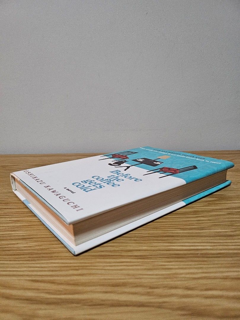 Before the Coffee Gets Cold (Hardcover) (Category: Storybooks) located in Quezon City. Submitted by nndvy (Listing ID 1469955292, Image 2). Description: - Condition: Read once. Minor storage wear on the jacket, but clean pages and flawless hardcover - RFS: Decluttering - MOP: Gcash, BPI, Unionbank, BDO - Delivery: GrabExpress, Lalamove, LBC (shouldered by buyer).