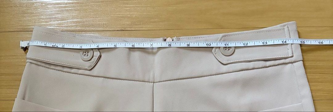 Beige High-Waisted Shorts Size 28-30 (Category: Shorts) located in Quezon City. Submitted by garagesale2026 (Listing ID 1470121751, Image 3). Description: - Never used, washed - From Bangkok - With front side pockets and a back zip closure.