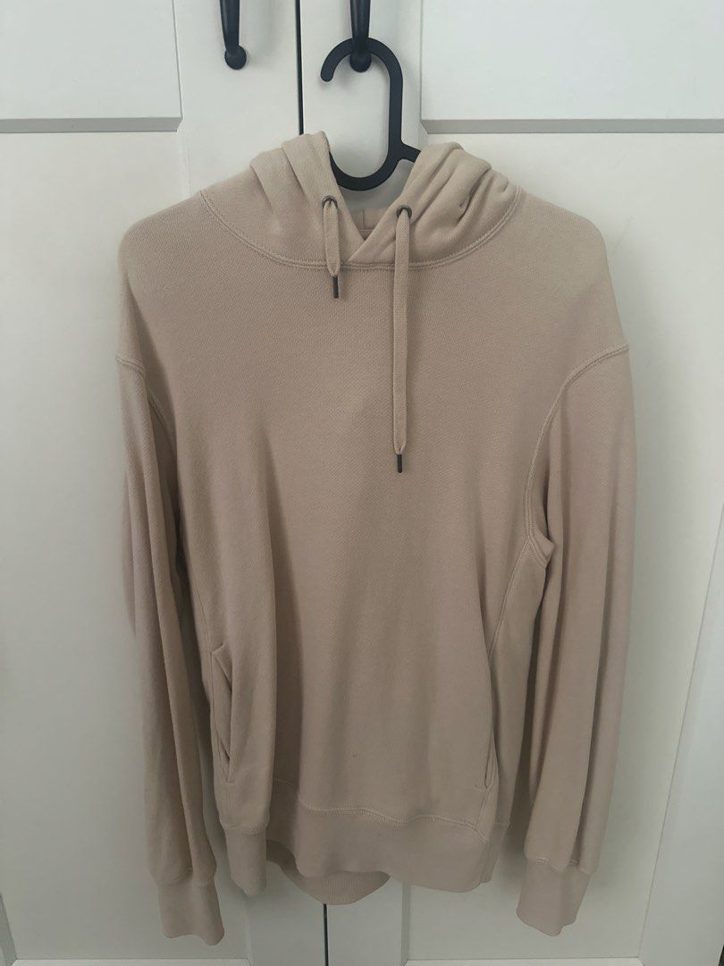 Beige Hooded Sweatshirt with Drawstrings (Category: Coats, Jackets and Outerwear) located in Manila. Submitted by kirstenxd (Listing ID 1470015781, Image 1). Description: - Color: Versatile beige - Fit: Classic pullover style - Material: Soft and cozy cotton blend - Features: Front kangaroo pocket and matching drawstrings - Details: Ribbed cuffs and hem for extra comfort - Best for: Daily errands, casual outings, or lounging at home.