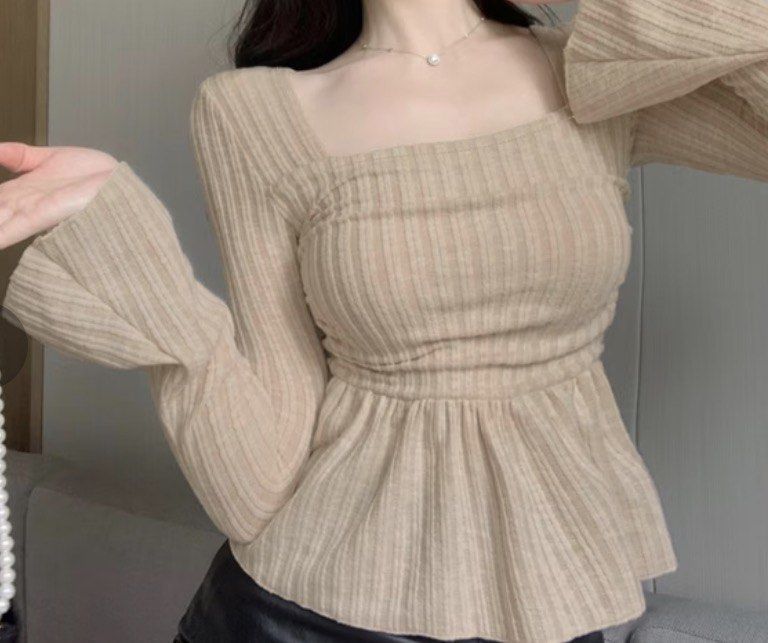 Beige ribbed square neck peplum top long sleeve (Category: Sleeveless) located in Las Pinas. Submitted by sxo.seya (Listing ID 1469978837, Image 1). Description: - Color: Beige - Style: Long sleeve top with a trendy square neckline - Fabric: Comfortable ribbed texture throughout - Fit: Fitted bodice with a flattering peplum hem - Versatility: Easy to match with pants or skirts, perfect for casual outings and dates.