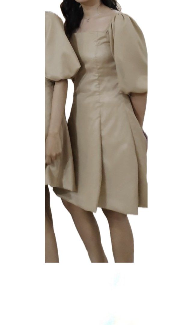 Beige Square Neck Puff Sleeve Dress (Category: Dresses) located in Santa Rosa. Submitted by maaarrriieela (Listing ID 1469976700, Image 2). Description: - Color: Neutral beige - Style: Midi dress with square neckline and dramatic puff sleeves - Details: Gathered elastic cuffs, fitted bodice with vertical panel seams, slight flare skirt - Fit: True to size - Perfect for: Gatherings, dinners, and special events.