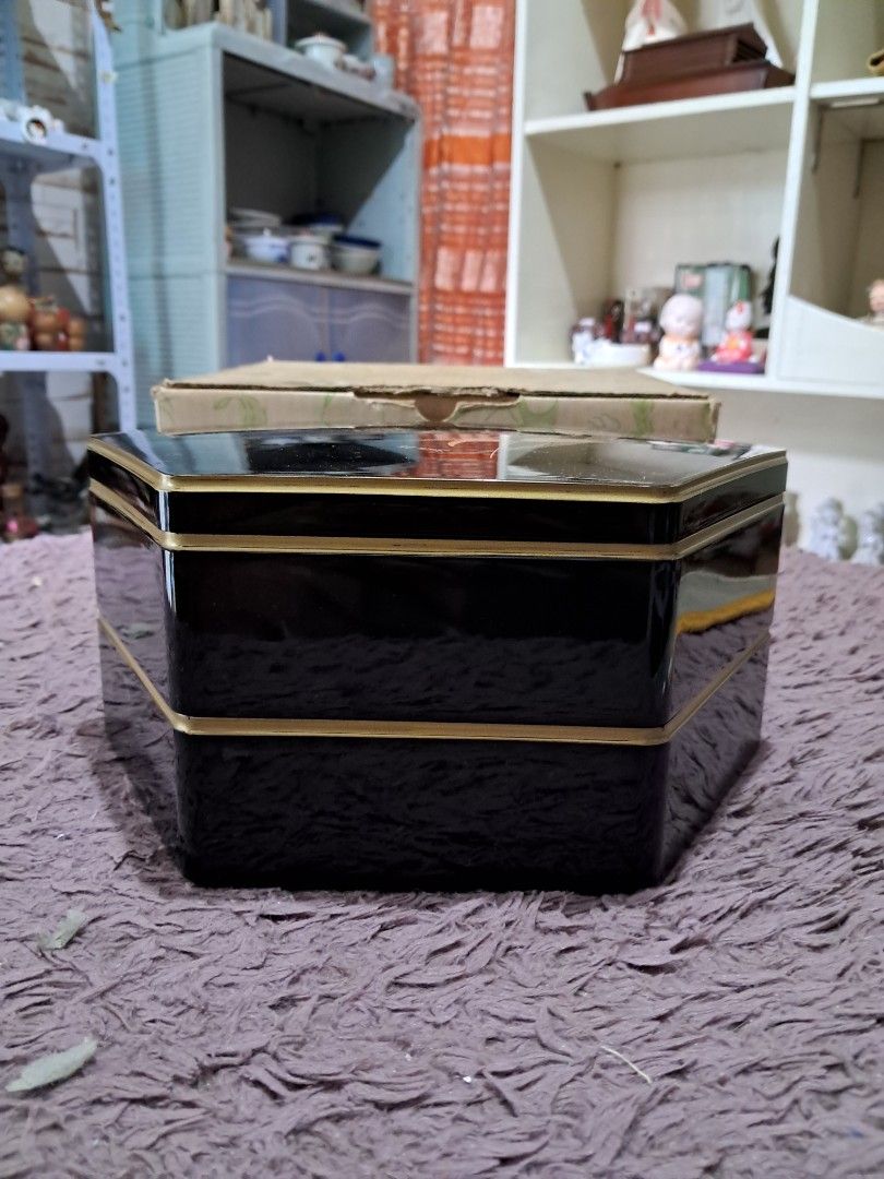 Bento box gift set (Category: Dinnerware & Cutlery) located in Cavite. Submitted by secretjapansurplus (Listing ID 1469986618, Image 2). Description: Brand New Old Stock] Yumi Katsura Hexagonal 2-Tier Japanese Lacquerware Box • Condition: Brand New Old Stock (NOS). Unused, pristine, and glossy. Comes with the original box (box shows minor storage wear due to age). • Design: Elegant glossy black exterior featuring a floral motif and Yumi Katsura's
