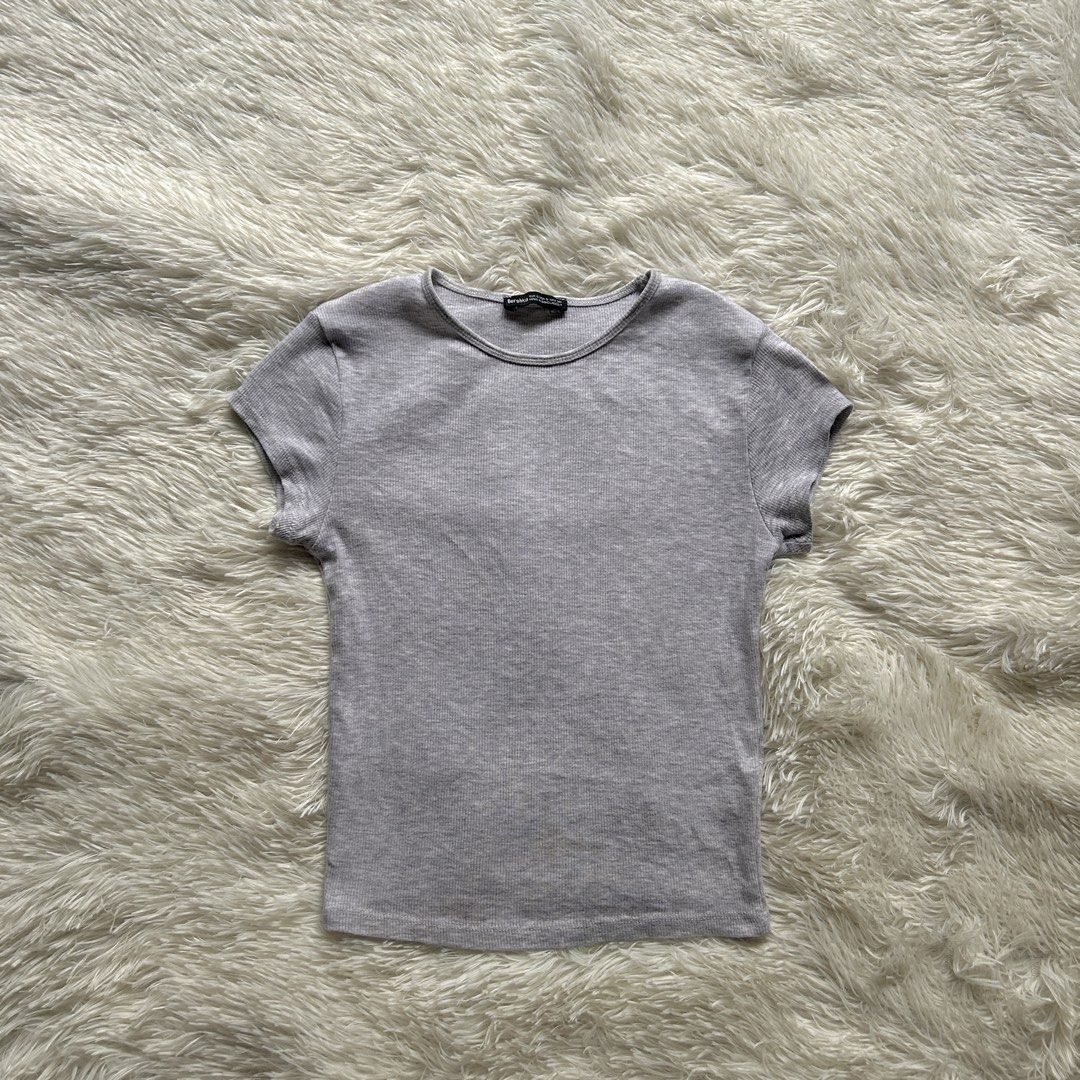 Bershka Basic Top (Category: Blouses) located in Cavite. Submitted by closetbycole (Listing ID 1470122597, Image 1). Description: — preloved — small-medium — stretchable.