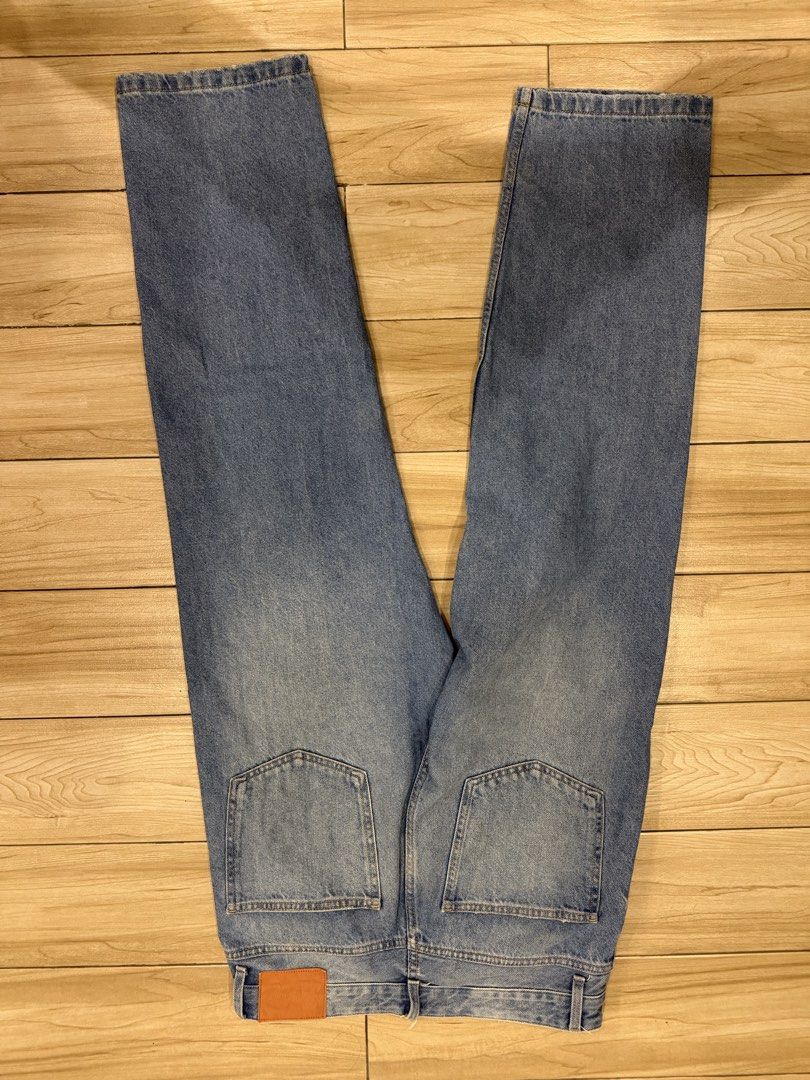 Bershka Light Blue Jeans (Category: Jeans) located in Santa Rosa. Submitted by jericobngo (Listing ID 1469950949, Image 3). Description: - Brand: Bershka - Fit: Straight fit - Size: EUR 40 / USA 31 (Medium), fits waist 30-32 - Color/Wash: Medium blue with light fading on front thighs - Details: Classic five-pocket setup, button fly, branded hardware, and back leather patch - Condition: Clean fabric, well-maintained.