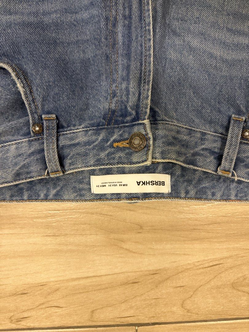 Bershka Light Blue Jeans (Category: Jeans) located in Santa Rosa. Submitted by jericobngo (Listing ID 1469950949, Image 2). Description: - Brand: Bershka - Fit: Straight fit - Size: EUR 40 / USA 31 (Medium), fits waist 30-32 - Color/Wash: Medium blue with light fading on front thighs - Details: Classic five-pocket setup, button fly, branded hardware, and back leather patch - Condition: Clean fabric, well-maintained.