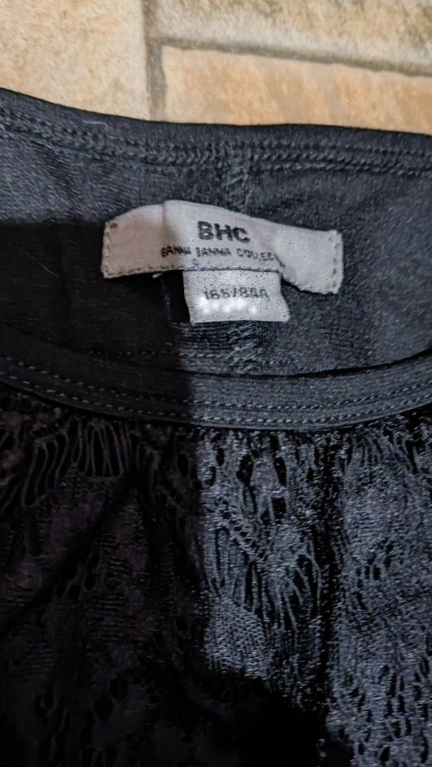 BHC Black Lace Dress (Category: Dresses) located in Mangatarem. Submitted by itsumo_kokoro (Listing ID 1469977921, Image 3). Description: - Brand: BHC - Size: 165/84A - Color: Classic black - Design: Intricate lace detailing on upper bodice and sleeves with scalloped edges and a round neckline - Occasion: Ideal for evening wear and parties - Condition: Clean and ready to wear -above the knee.