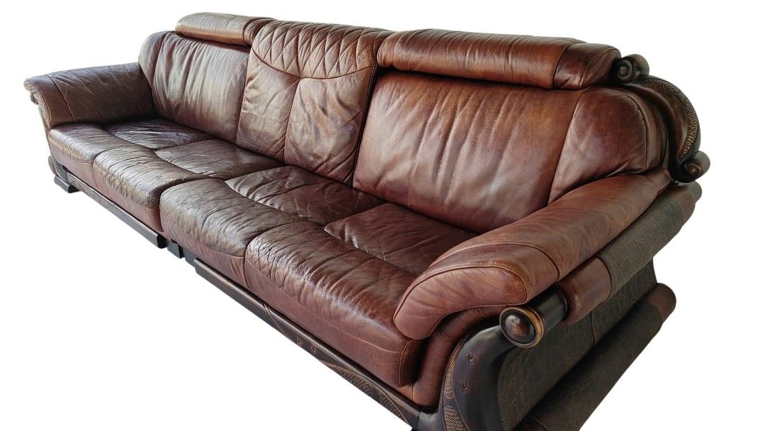 BIG ELEGANT GERMAN LEATHER SOFA (Category: Sofas) located in Mexico. Submitted by mgracejapansurplus (Listing ID 1470070677, Image 3). Description: BIG ELEGANT GERMAN LEATHER SOFA ✨ - Premium genuine German leather in rich warm brown - Sturdy carved wooden armrests, heavy & solid build - Quilted diamond stitching on backrest — elegant classic design - Generous 4-seater size: L125" × W40" × H36" | Seat: L96" × H15" - Condition note: Minor scratche