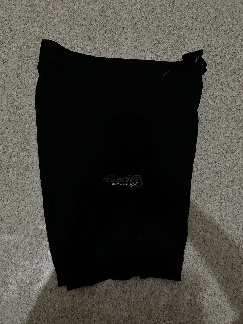 Billabong Platinum X Hydrostretch Boardshorts Size 31 (Category: Swim Trunks & Board Shorts) located in Angeles City. Submitted by johngamboa (Listing ID 1469951271, Image 3). Description: - Brand: Billabong Platinum X - Color: Black - Size: 31 - Material: 100% polyester quick-dry hydrostretch fabric with PX:4 technology - Details: Drawstring waist with branded aglets and contrast wave logo graphic near the hem - Condition: Clean inside and out, 