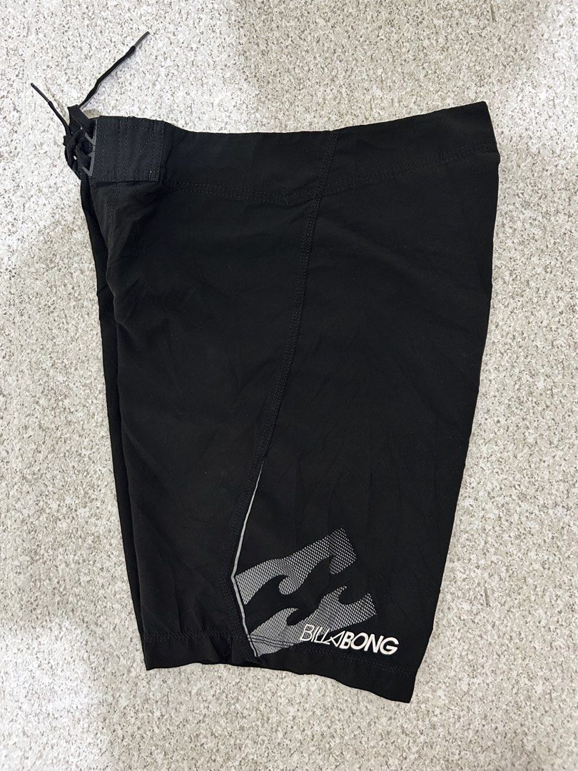 Billabong Platinum X Hydrostretch Boardshorts Size 31 (Category: Swim Trunks & Board Shorts) located in Angeles City. Submitted by johngamboa (Listing ID 1469951271, Image 1). Description: - Brand: Billabong Platinum X - Color: Black - Size: 31 - Material: 100% polyester quick-dry hydrostretch fabric with PX:4 technology - Details: Drawstring waist with branded aglets and contrast wave logo graphic near the hem - Condition: Clean inside and out, 