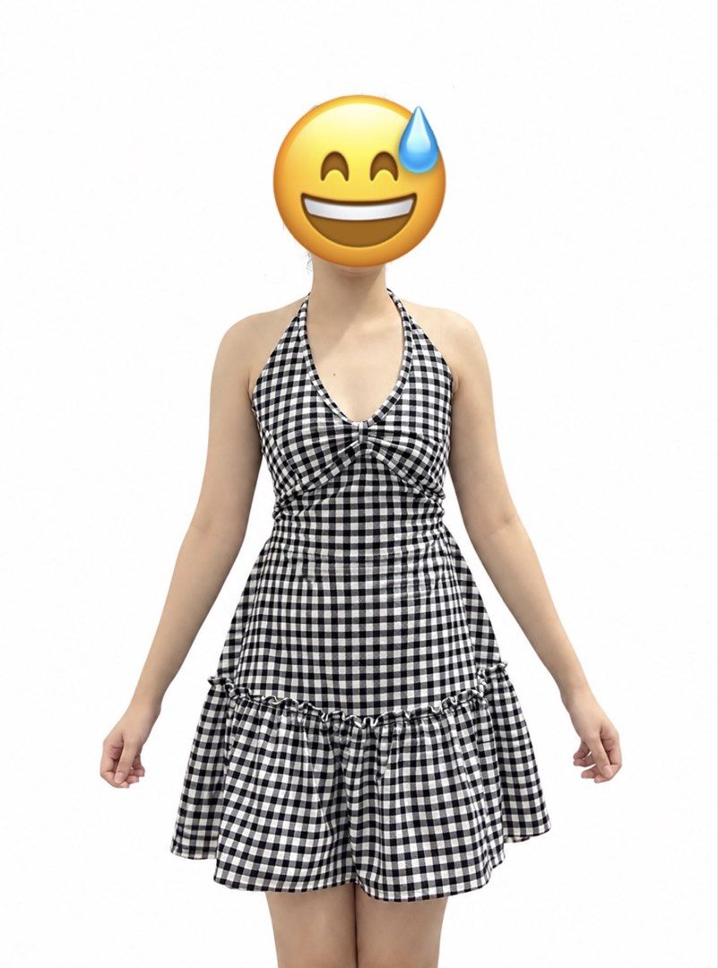Black and white gingham halter mini dress (Category: Dresses) located in Santa Rosa. Submitted by vastmountain.c924cd (Listing ID 1470126907, Image 1). Description: Black & white checkered picnic mini dress featuring a halter neck and layered ruffled skirt. Actual dress is worn in the photo Fits size S to M with a stretchy smocked back..